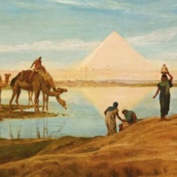 People and camels by the pyramids